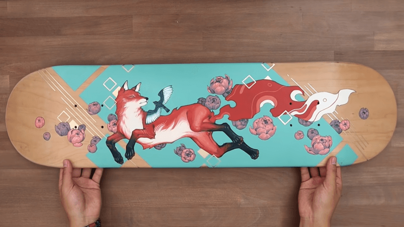 red mystical fox skateboard graphic design